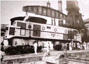 An M1 category train engine being unloaded at the Colombo Port.